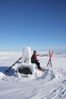 09-0460  Enjoying the Winter Sun on Burnhope Seat While Ski Touring With the View into Weardale County Durham